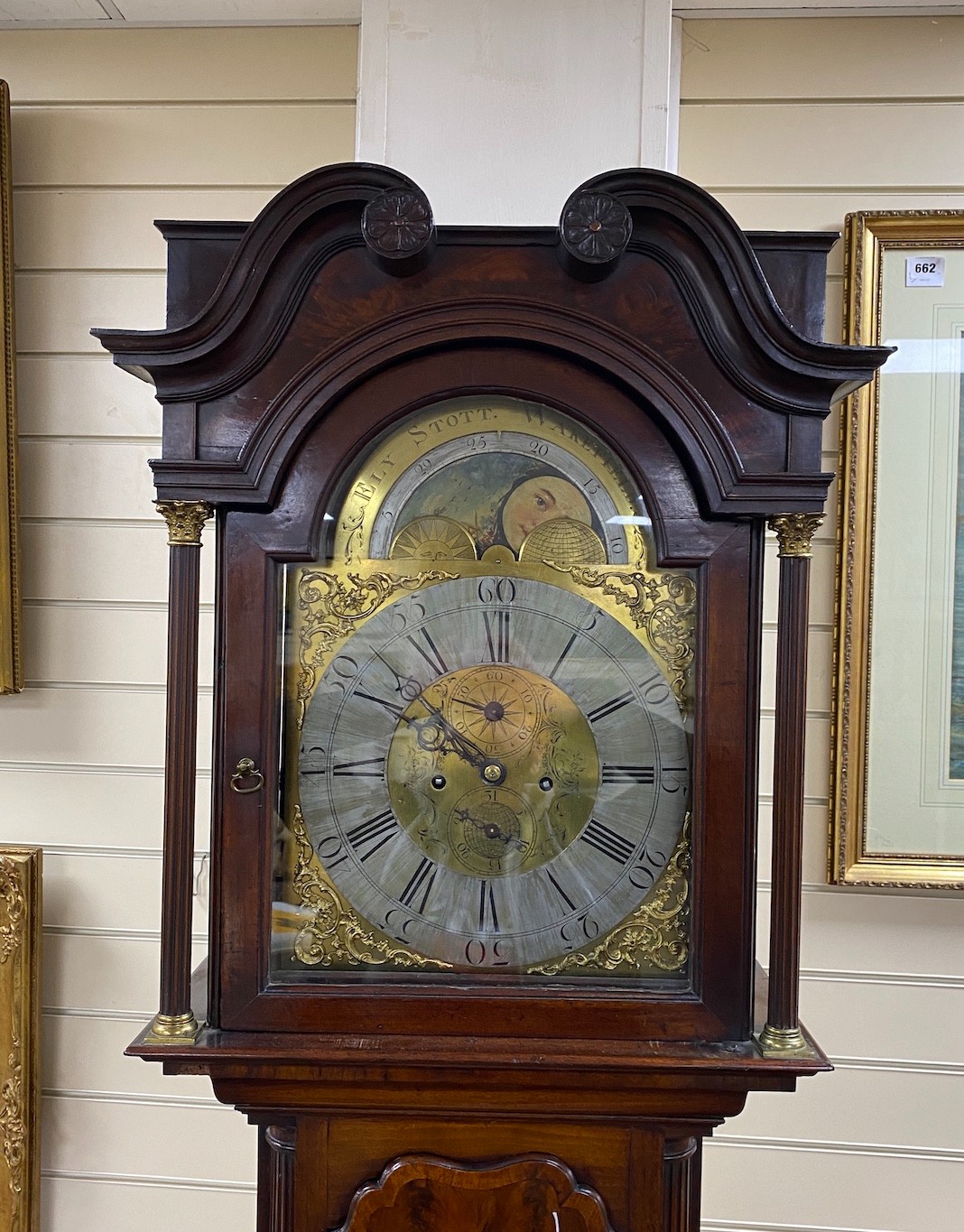 A George III mahogany 8 day longcase clock, the moonphase dial marked Ely Stott, Wakefield, height 227cm